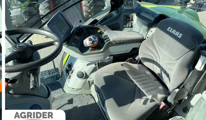 
								Claas Axion 810 full									