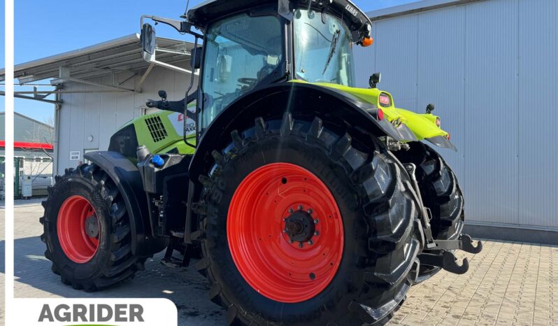 
								Claas Axion 810 full									