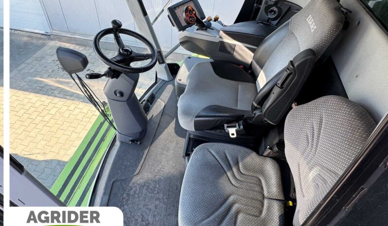 
								Claas Lexion 660 full									